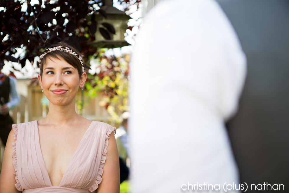Bride during ceremony in Calgary backyard wedding