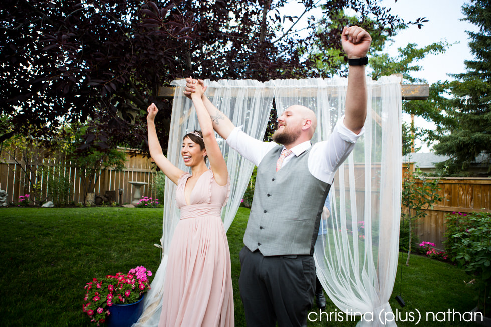 Bride and Groom celebrate after they become husband and wife photographed by Christina plus Nathan