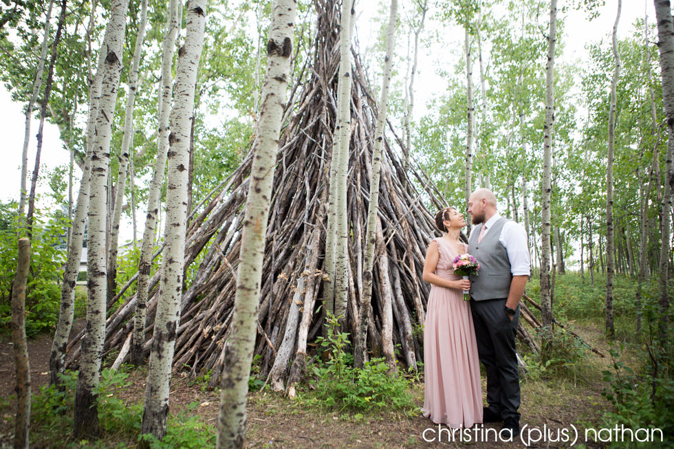 Unique wedding photography location with a teepee and pink wedding dress