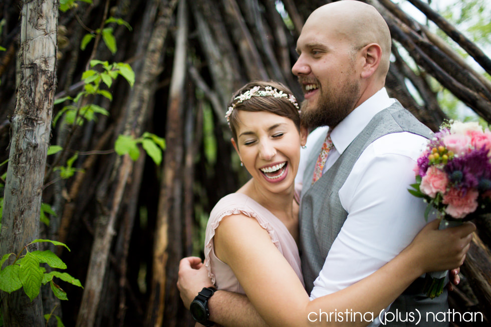 Laughing natural moment with bride and groom at Calgary wedding