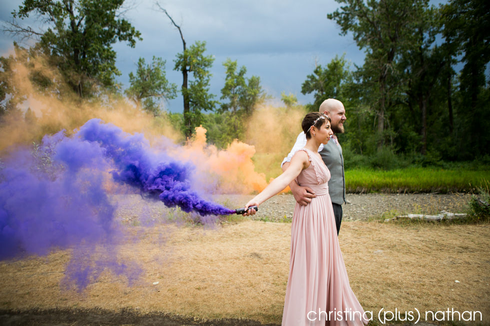 Purple and orange smoke bombs at wedding in Calgary, Alberta