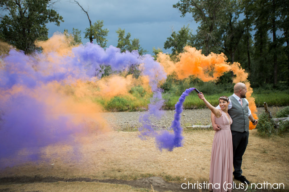 Bride and Groom with smoke bombs during wedding photography portrait session