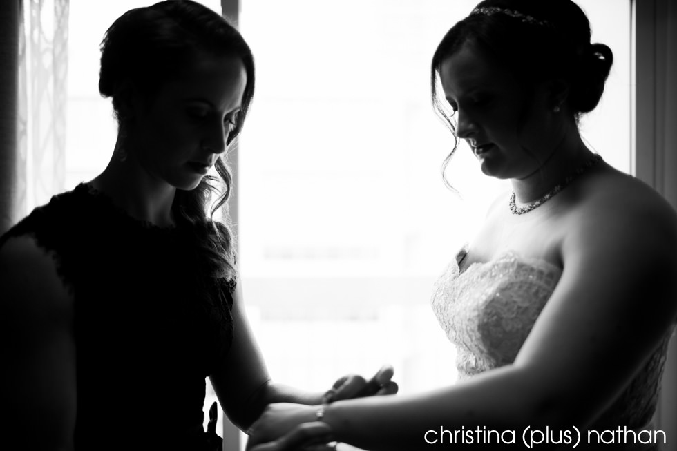 Bride getting ready for wedding in Calgary at hotel arts