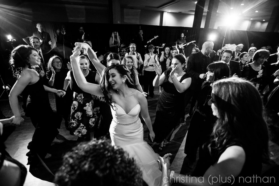 A large group at a wedding before the Covid-19 global pandemic.